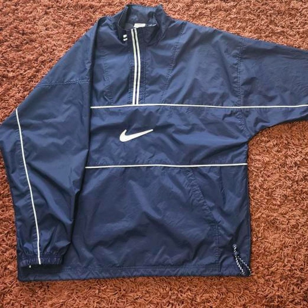 Vintage Nike Blue Windbreaker with Sporty White Accents